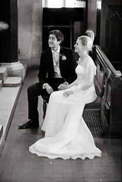 Bride and Groom sitting in the church