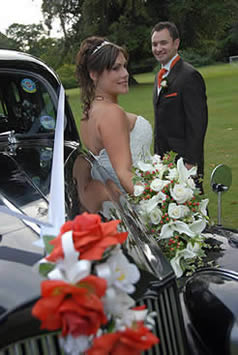 Bride getting out from the car